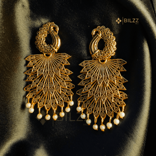 Golden Jhumka Earrings: Regal Beauty for Every Occasion - Bilzz.in